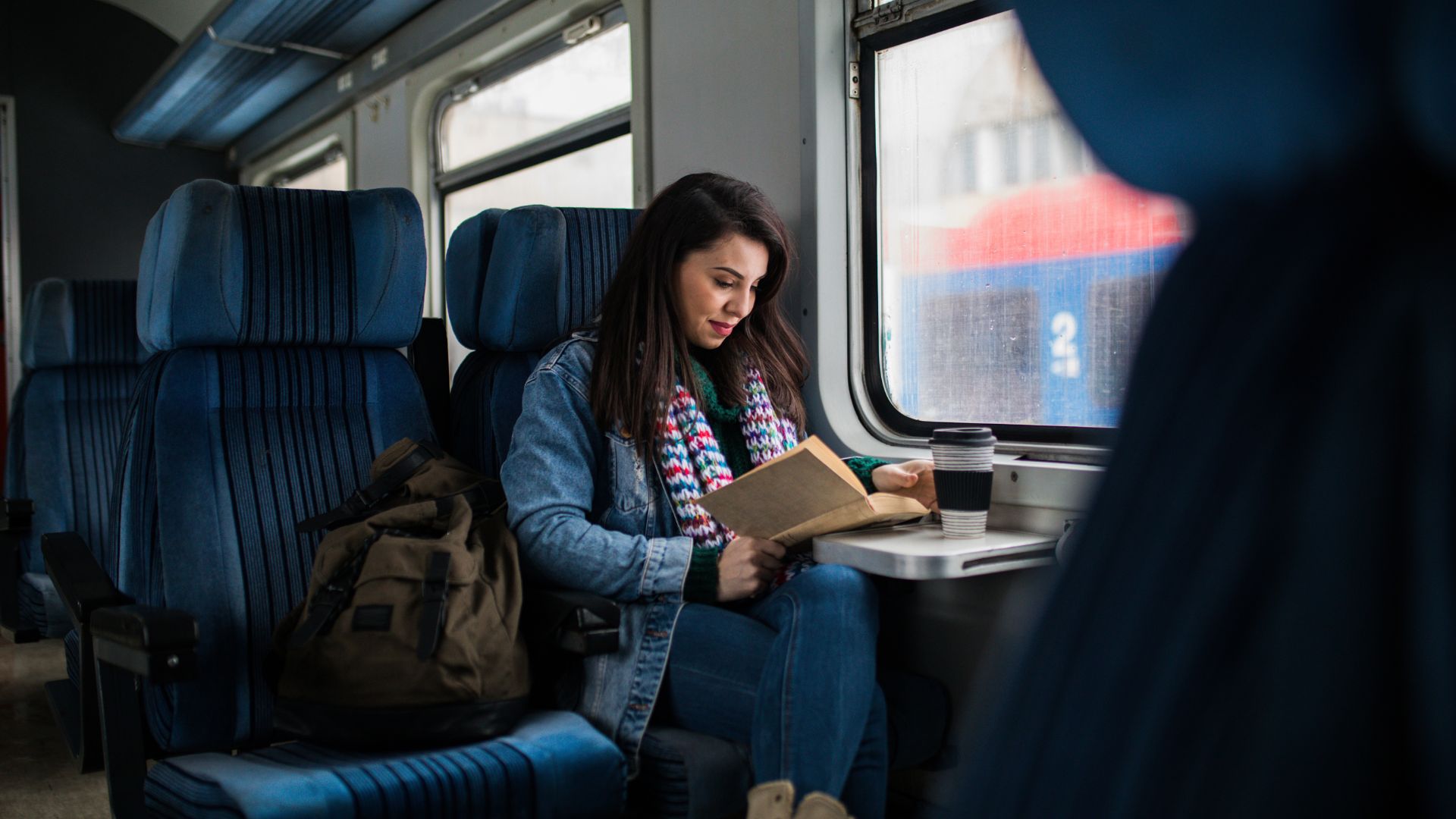 travel-sustanaible-France-train-woman-reading-2 Travel sustanaible France train woman reading